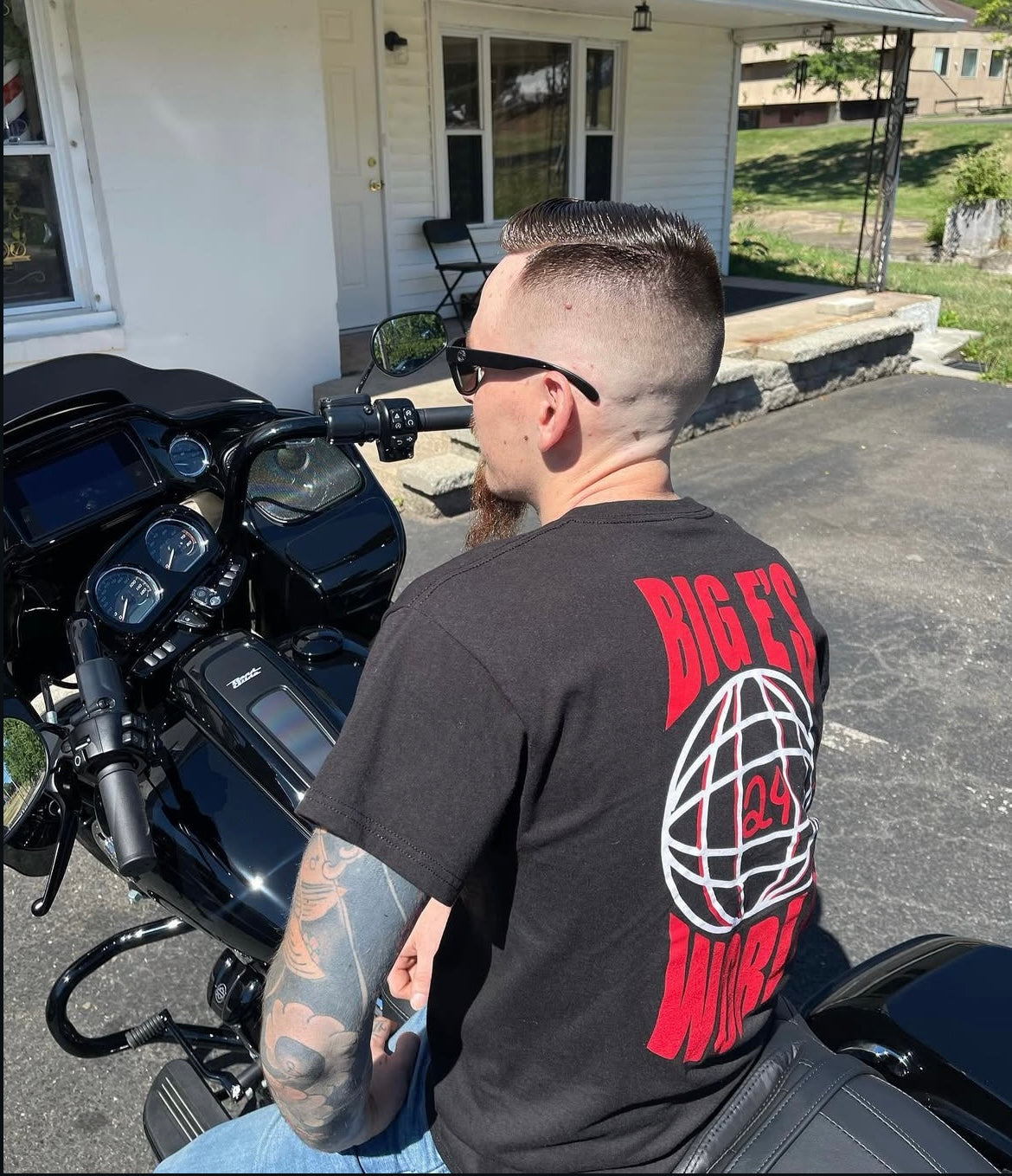 Big E’s World team shirt